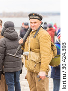 Russia Samara November 2018: Historical reconstruction of the battle of the Second World War. Portrait of a Russian soldier. Редакционное фото, фотограф Акиньшин Владимир / Фотобанк Лори