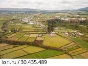 Aerial view of a village and fields on the island of Terceira, Azores (2012 год). Стоковое фото, фотограф Юлия Бабкина / Фотобанк Лори