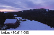 Уральские горы зимой. Рассвет. Избушка на вершине горы. Ural mountains in winter. Dawn. Hut on top of the mountain. Стоковое видео, видеограф Евгений Романов / Фотобанк Лори