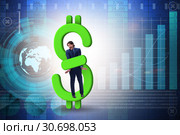Businessman in dollar and debt concept. Стоковое фото, фотограф Elnur / Фотобанк Лори