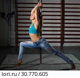 Woman on pylon in lightless studio. Стоковое фото, фотограф Яков Филимонов / Фотобанк Лори