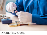 Young jeweler working in his workshop. Стоковое фото, фотограф Elnur / Фотобанк Лори