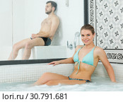 woman in turquoise swimsuit posing in jacuzzi. Стоковое фото, фотограф Яков Филимонов / Фотобанк Лори