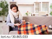 Sick middle-aged woman suffering at home. Стоковое фото, фотограф Elnur / Фотобанк Лори