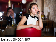 Unhappy woman talking on phone. Стоковое фото, фотограф Яков Филимонов / Фотобанк Лори