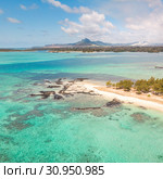 Aerial view of beautiful tropical beach with turquoise sea. Tropical vacation paradise destination of D'eau Douce and Ile aux Cerfs Mauritius. Стоковое фото, фотограф Matej Kastelic / Фотобанк Лори