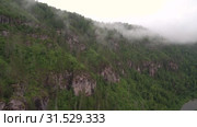 Уральские горы. Розовые скалы в тумане. Ural Mountains. Pink rocks in the mist. Стоковое видео, видеограф Евгений Романов / Фотобанк Лори