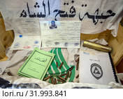 Документация террористов ИГИЛ, экспонат передвижной выставки "Сирийский перелом" (2019 год). Редакционное фото, фотограф Вячеслав Палес / Фотобанк Лори
