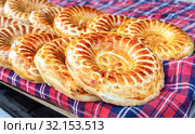 Baked traditional uzbek round flatbread. Стоковое фото, фотограф FotograFF / Фотобанк Лори