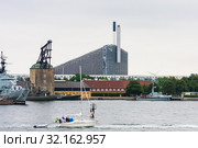 View of Amager Bakke or Amager Hill also known as Amager Slope or Copenhill, a combined heat and power waste-to-energy plant in Amager, Copenhagen, Denmark. Редакционное фото, фотограф Николай Коржов / Фотобанк Лори