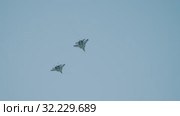 30 AUGUST 2019 MOSCOW, RUSSIA: blue reactive jets flying in the clear sky. Редакционное видео, видеограф Константин Шишкин / Фотобанк Лори