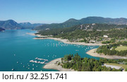 Serene summer landscape of Lake Serre-Poncon, artificial lake surrounded by French Alps, Provence-Alpes-Cote d Azur region (2019 год). Стоковое видео, видеограф Яков Филимонов / Фотобанк Лори
