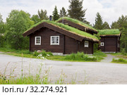 Отдельные коттеджи в гостинице Bardola Hoyfjellshotell в селении Гейло в Норвегии (2013 год). Редакционное фото, фотограф Солодовникова Елена / Фотобанк Лори