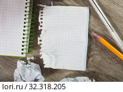 Torn crumpled notebook sheet. Стоковое фото, фотограф Яков Филимонов / Фотобанк Лори