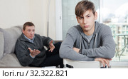 Teenager son quarreled with her father. Стоковое фото, фотограф Яков Филимонов / Фотобанк Лори