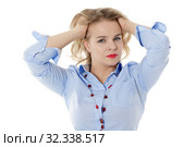Уставшая девушка схватилась руками за голову, изолировано на белом фоне. Стоковое фото, фотограф Игорь Долгов / Фотобанк Лори