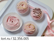 Aerial pink cherry marshmallows. Different shapes and sizes. Sprinkled with dextrose. Garnished with Chocolate. Стоковое фото, фотограф Vadzim Yakubovich / Фотобанк Лори