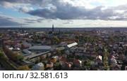 Aerial view of Olomouc cityscape overlooking Gothic spire of Saint Wenceslas Cathedral on sunny autumn day, Moravia, Czech Republic (2019 год). Стоковое видео, видеограф Яков Филимонов / Фотобанк Лори