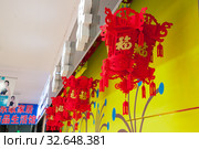 China, Heihe, July 2019: Chinese red lanterns at Huafu shopping center. Редакционное фото, фотограф Катерина Белякина / Фотобанк Лори