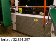 Interior elements of public transport on a blurred background (2020 год). Редакционное фото, фотограф Евгений Харитонов / Фотобанк Лори