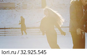 A young blonde woman skating on the ice rink. Стоковое видео, видеограф Константин Шишкин / Фотобанк Лори