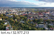 Aerial view of Olomouc cityscape overlooking Gothic spire of Saint Wenceslas Cathedral on sunny autumn day, Moravia, Czech Republic (2019 год). Стоковое видео, видеограф Яков Филимонов / Фотобанк Лори