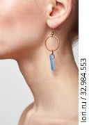 Beautiful woman with galvanic earring in form of blue crystal. Стоковое фото, фотограф Сергей Пристяжнюк (Serg Zastavkin) / Фотобанк Лори