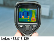 thermal imaging camera inspection for temperature check and finding heating pipes. Стоковое фото, фотограф Дмитрий Калиновский / Фотобанк Лори