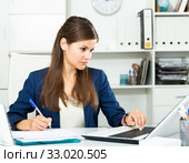 Successful adult business woman using laptop at workplace. Стоковое фото, фотограф Яков Филимонов / Фотобанк Лори