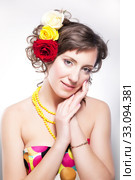 Beautiful woman - vernal happy young girl with flowers closeup. Стоковое фото, фотограф Iryna Hramavataya / PantherMedia / Фотобанк Лори