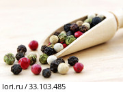 Colorful Peppers Mix in wooden scoop. Стоковое фото, фотограф Gábor Páll / PantherMedia / Фотобанк Лори