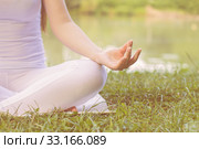 Yoga Woman Meditating Relaxing Healthy Lifestyle. Стоковое фото, фотограф Mitar gavric / PantherMedia / Фотобанк Лори