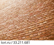 Retro looking Brick wall. Стоковое фото, фотограф Claudio Divizia / Smarterpix / Фотобанк Лори