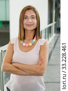 young happy business woman at the office. Стоковое фото, фотограф Rui Vale de Sousa / Smarterpix / Фотобанк Лори