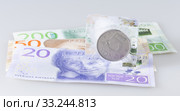 Swedish Five Krona Coin in Ice. Стоковое фото, фотограф Niklas Emmoth / PantherMedia / Фотобанк Лори