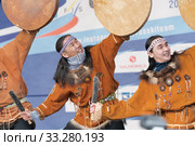 Group aborigine dancer in traditional clothes native people dancing with tambourine. Concert Koryak Dance Ensemble Mengo (2019 год). Редакционное фото, фотограф А. А. Пирагис / Фотобанк Лори