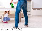 Drunk father in domestic child abuse and violence concept. Стоковое фото, фотограф Elnur / Фотобанк Лори