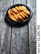 potato cakes topped with grated cheddar cheese. Стоковое фото, фотограф Oksana Zh / Фотобанк Лори