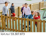 Group of children playing romp game Touch-last outdoors. Стоковое фото, фотограф Яков Филимонов / Фотобанк Лори