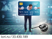 Businessman in credit card burden concept in pillory. Стоковое фото, фотограф Elnur / Фотобанк Лори
