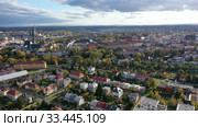 Aerial view of Olomouc cityscape overlooking Gothic spire of Saint Wenceslas Cathedral on sunny autumn day, Moravia, Czech Republic (2019 год). Стоковое видео, видеограф Яков Филимонов / Фотобанк Лори