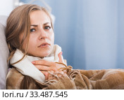 Young woman catching cold. Стоковое фото, фотограф Яков Филимонов / Фотобанк Лори