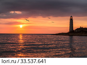 Cape Chersonesos lighthouse at sunset, Sevastopol, Crimea, Russia (2015 год). Редакционное фото, фотограф Наталья Волкова / Фотобанк Лори