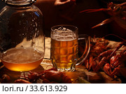 Crayfish with beer on a wooden table. Стоковое фото, фотограф Марина Володько / Фотобанк Лори