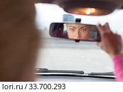 Lady looking back while reversing. Стоковое фото, фотограф Matej Kastelic / Фотобанк Лори