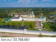 Тихвинский Успенский Богородичный монастырь солнечным июльским днем (аэрофотосъемка). Тихвин, Россия (2018 год). Стоковое фото, фотограф Виктор Карасев / Фотобанк Лори