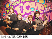 London, United Kingdom - August 24, 2017: The Beatles in Madame Tussauds. Редакционное фото, фотограф Nataliia Zhekova / Фотобанк Лори