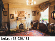 LONDON - AUGUST 24, 2017: The Sherlock Holmes museum is located on Baker Street and is dedicated to the fictional detective Sherlock Holmes. Редакционное фото, фотограф Nataliia Zhekova / Фотобанк Лори