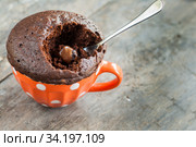 Chocolate pie in a cup filled with a liquid. Стоковое фото, фотограф Tetiana Chugunova / Фотобанк Лори