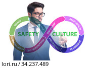 Businessman in safety culture concept. Стоковое фото, фотограф Elnur / Фотобанк Лори